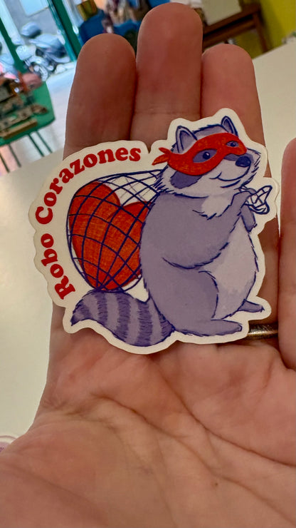 Sticker / Pegatina Mapache roba corazones