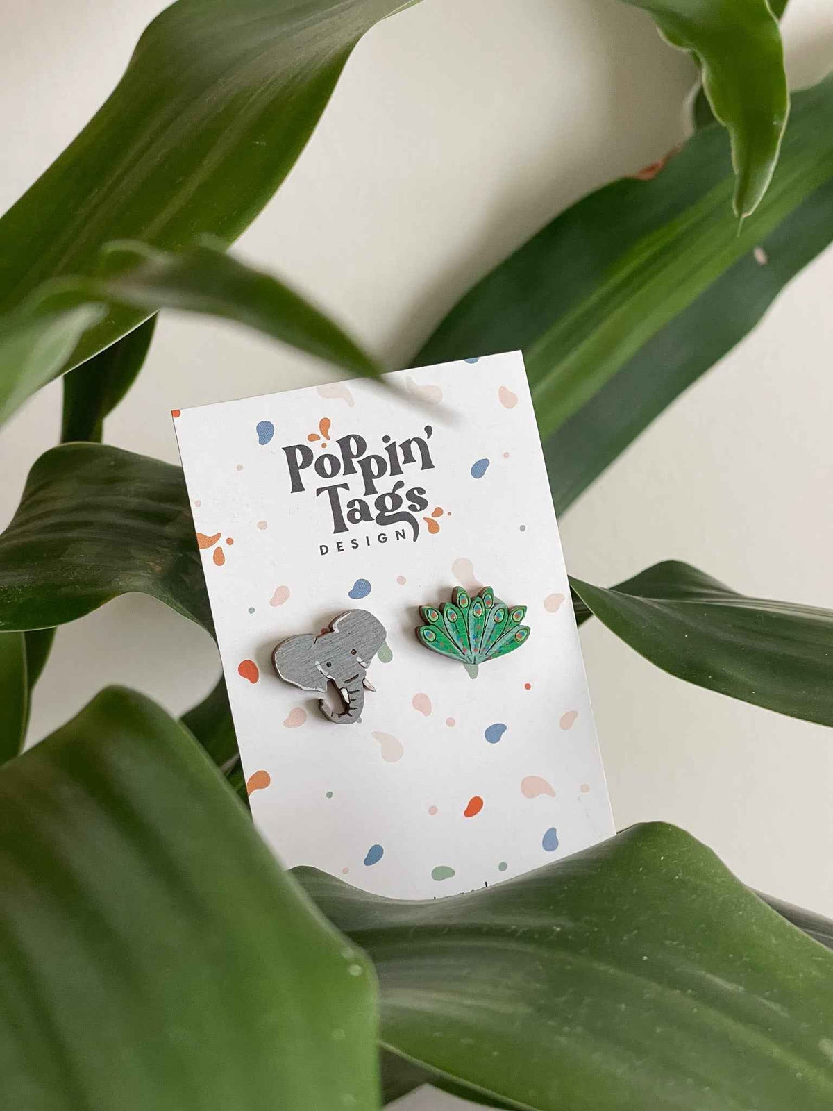 Pendientes: Elefante y Pavo Real