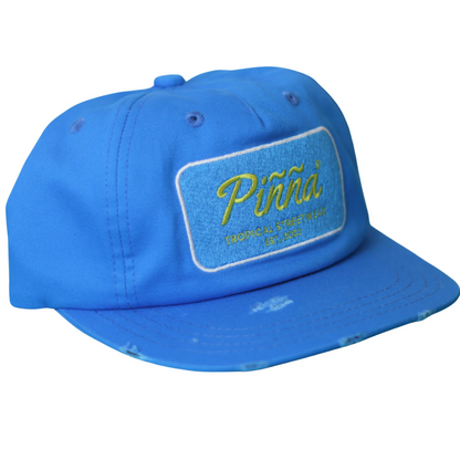 Gorra Azul Gastada Piñña – Logo en Amarillo